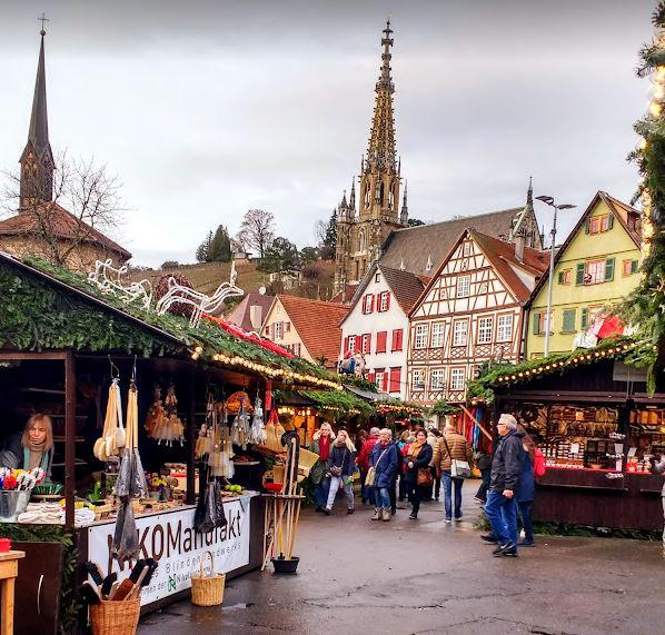 Church spires and the half-timbered houses of Esslingen form the backdrop to the Esslingen christmas market