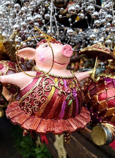 A Christmas bauble pig dressed up as a ballet dancer