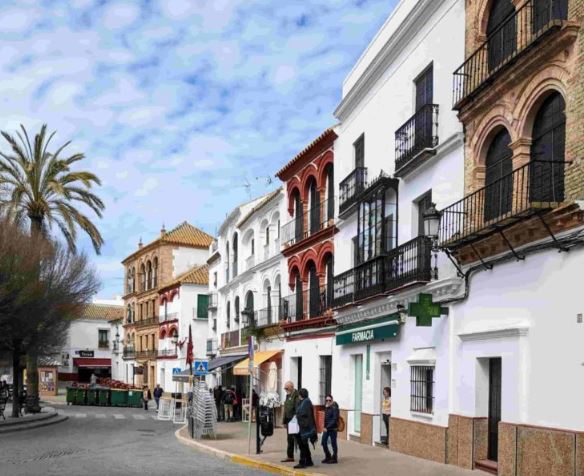 The buildings wrapped around the central plaza in Carmona