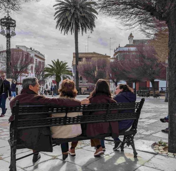 A family watching the world go by in Carmona