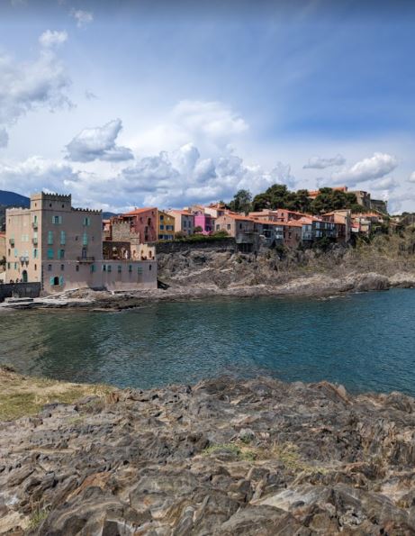 The view of the town of Collioure and its rocky coastline