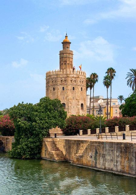 Toro del Oro next to the river running through Seville